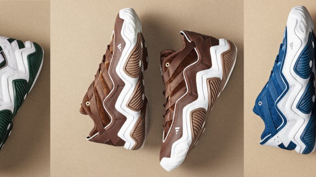 Side view of three multi-color adidas sneakers.